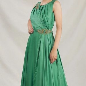 Green flared gown with placement floral embroidered motifs & pleated bodice